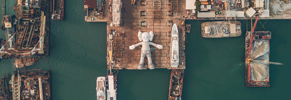 The 37-meter-COMPANION docking in Victoria Harbour - KAWS:HOLIDAY HONG KONG